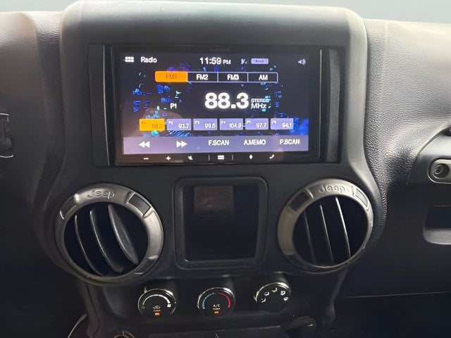 Pre-Owned 2016 Jeep Wrangler Unlimited Sport - photo - 9